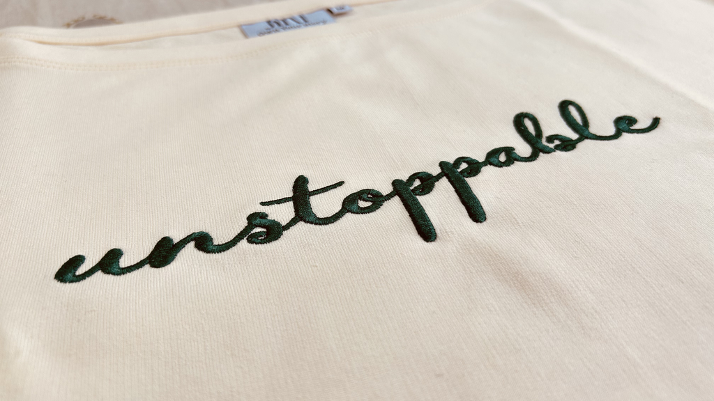 Oversized Boat-neck T-Shirt for woman: Unstoppable