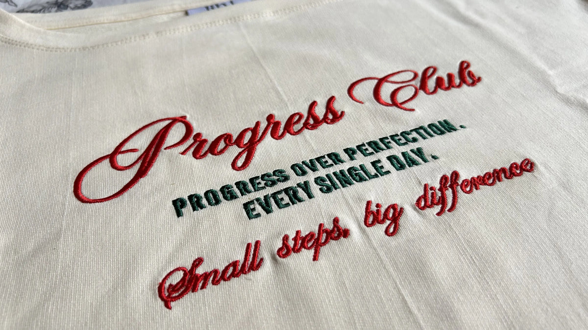 Oversized Boat-neck T-Shirt for woman: Progress Club